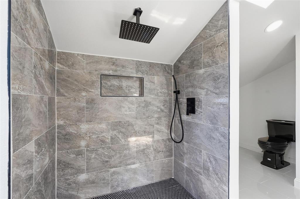 10332 Muskogee Circle Dallas, TX 75217 - Photo 29 of 39 a bathroom with a shower