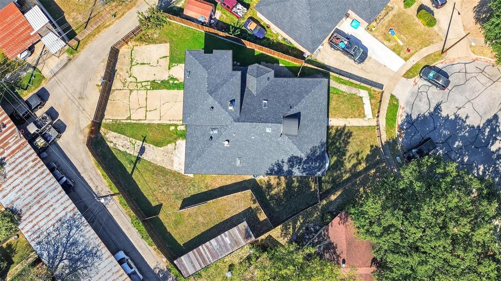 10332 Muskogee Circle Dallas, TX 75217 - Photo 3 of 39 an aerial view of a house with a garden and swimming pool