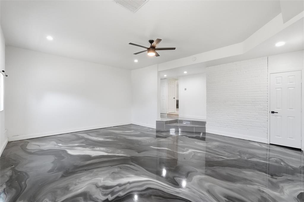 10332 Muskogee Circle Dallas, TX 75217 - Photo 32 of 39 a view of empty room with wooden floor