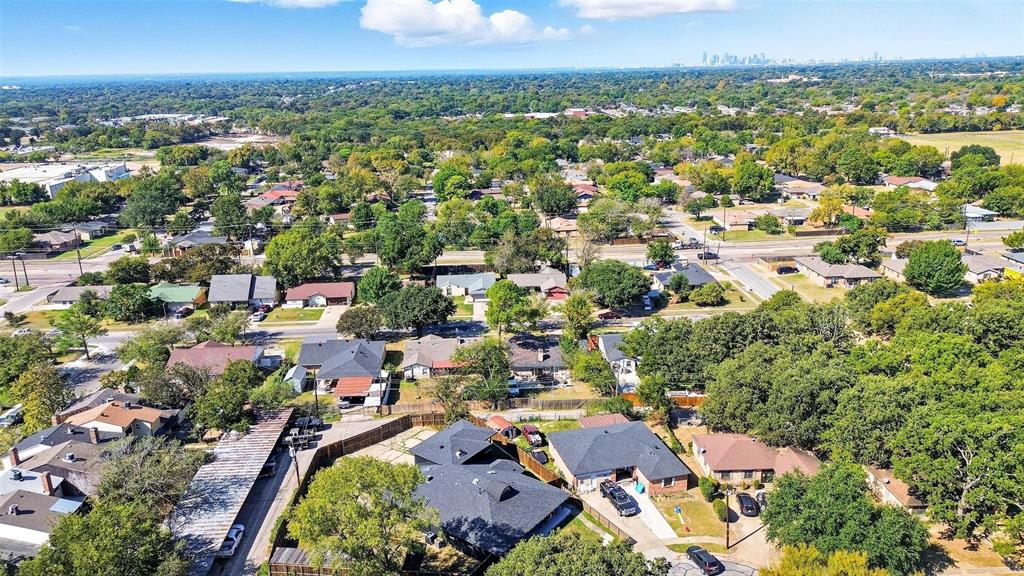 10332 Muskogee Circle Dallas, TX 75217 - Photo 4 of 39 an aerial view of residential houses with outdoor space and trees