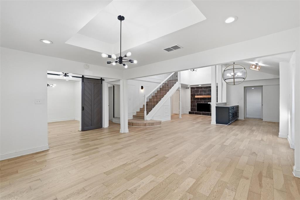 10332 Muskogee Circle Dallas, TX 75217 - Photo 8 of 39 a view of a livingroom with a staircase