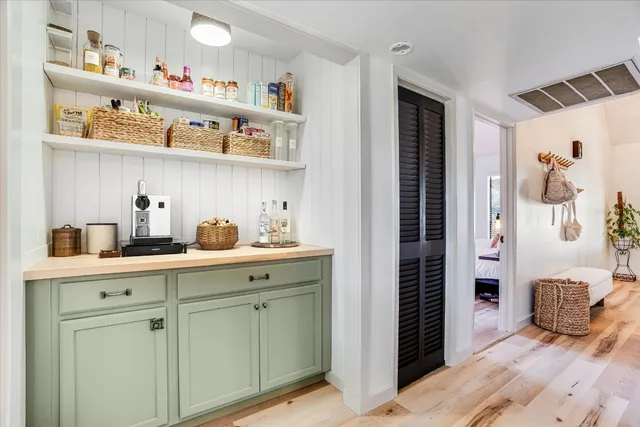 a view of entryway with wooden floor