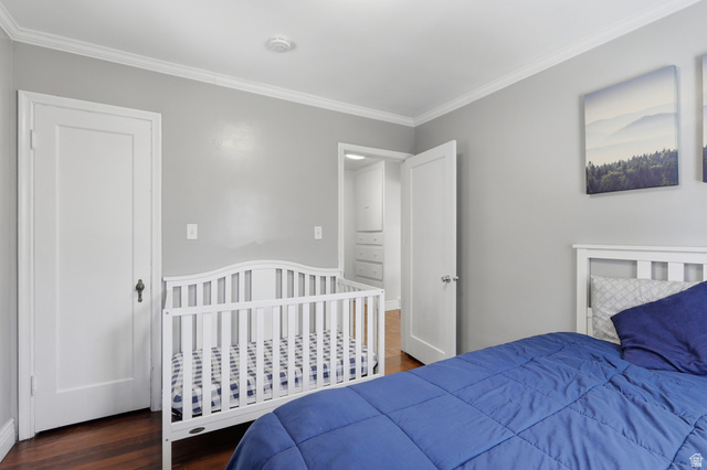 85 North 800 West Provo, UT 84601 - Photo 9 of 25 Bedroom featuring rich wood-finish flooring and crown molding