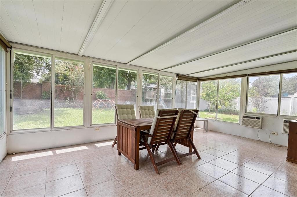 325 Longshadows Court Ocoee, FL 34761 - Photo 22 of 34 a dining area with furniture and a garden view