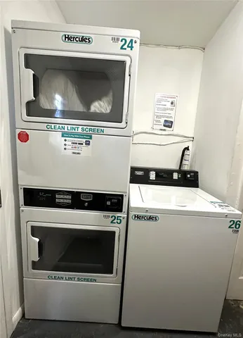 a spacious bathroom with a toilet sink and mirror
