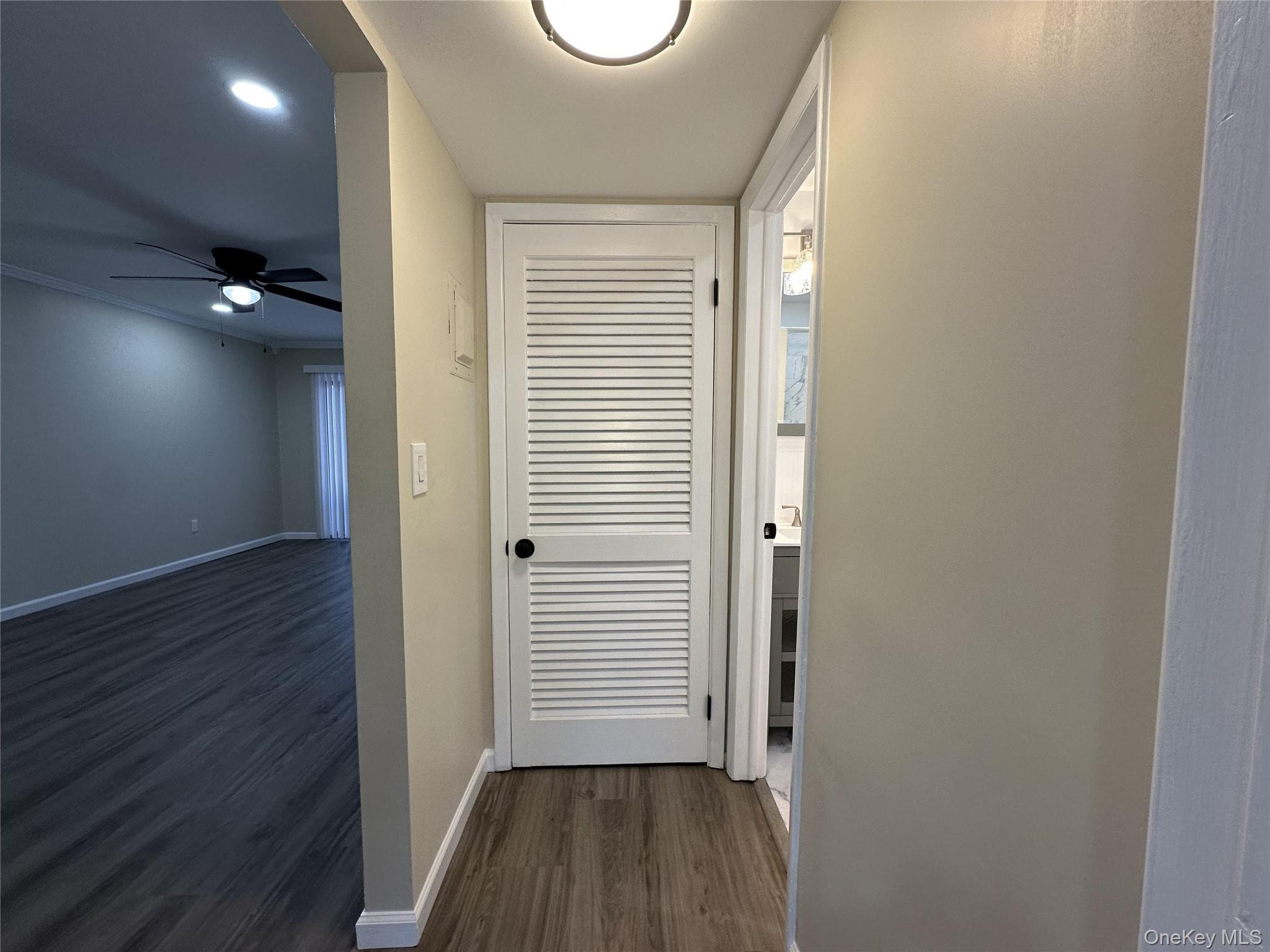 26 Cooper, Unit 511 Poughkeepsie, NY 12603 - Photo 14 of 15 a view of a room with wooden floor and a window