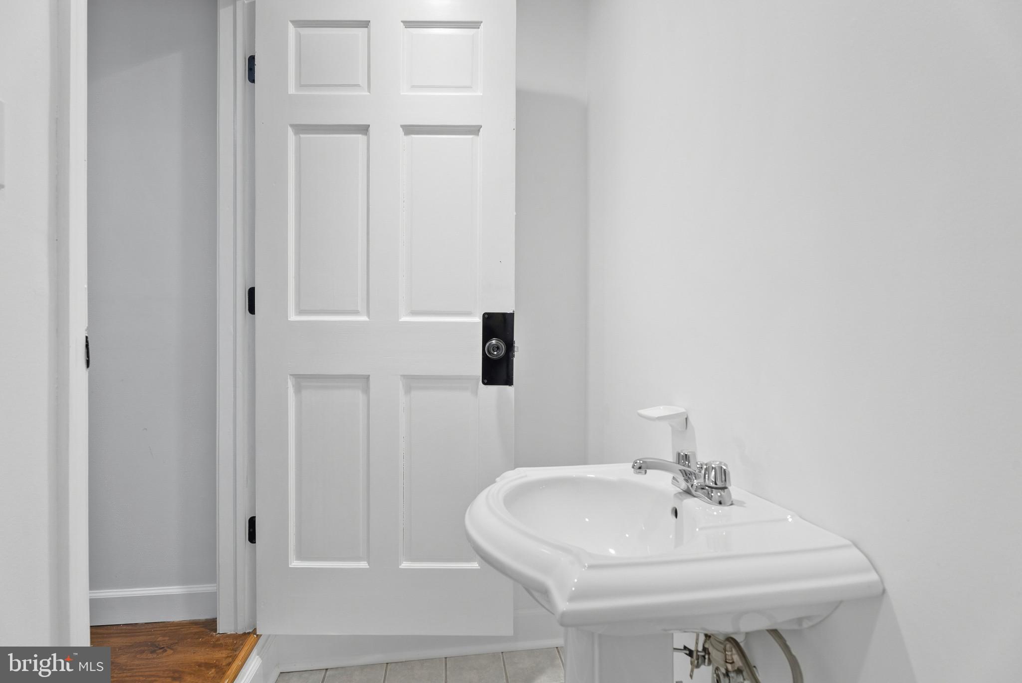 13054 Tarragon Road Reisterstown, MD 21136 - Photo 54 of 68 Half bathroom