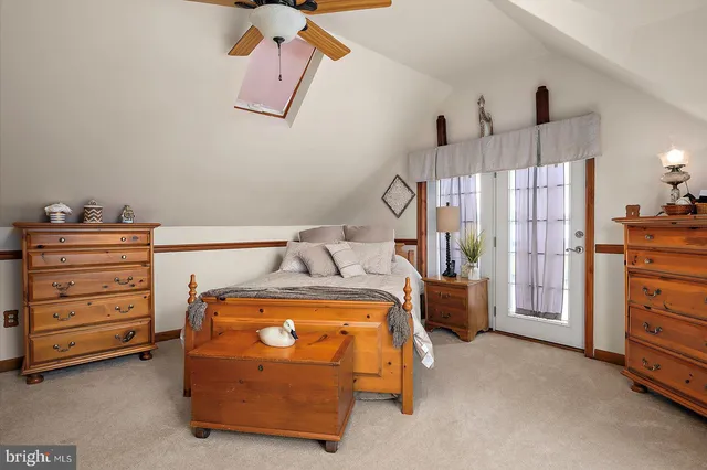 a view of a lake with a yard