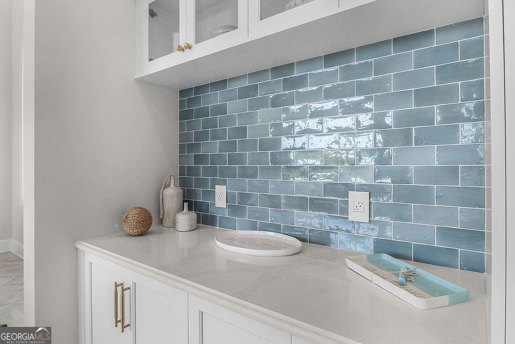 20 Taylor Street Tybee Island, GA 31328 - Photo 53 of 85 a bathroom with a sink a toilet