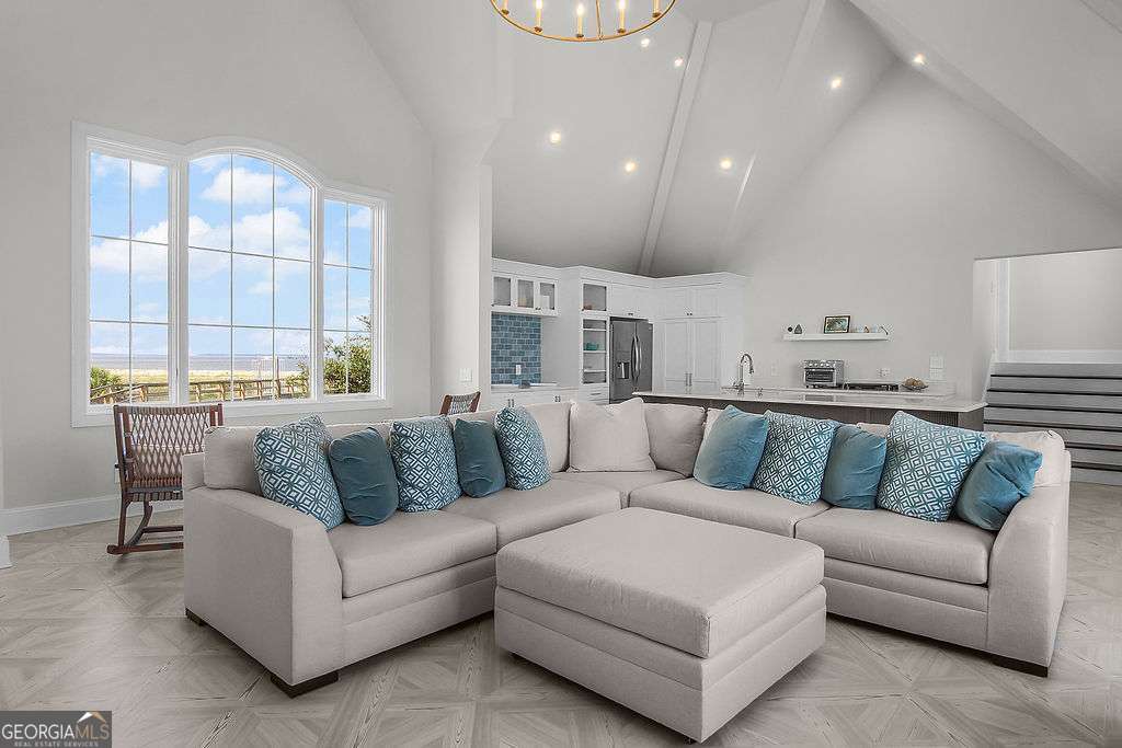 20 Taylor Street Tybee Island, GA 31328 - Photo 58 of 85 a living room with furniture and windows
