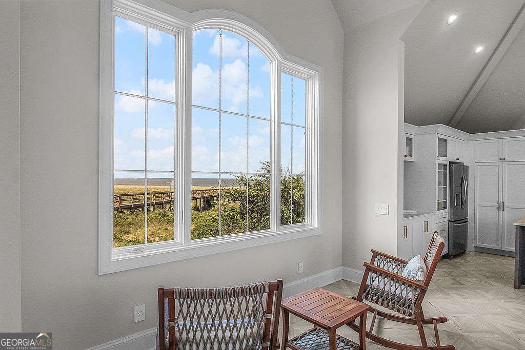 20 Taylor Street Tybee Island, GA 31328 - Photo 59 of 85 a view of a livingroom with furniture and windows