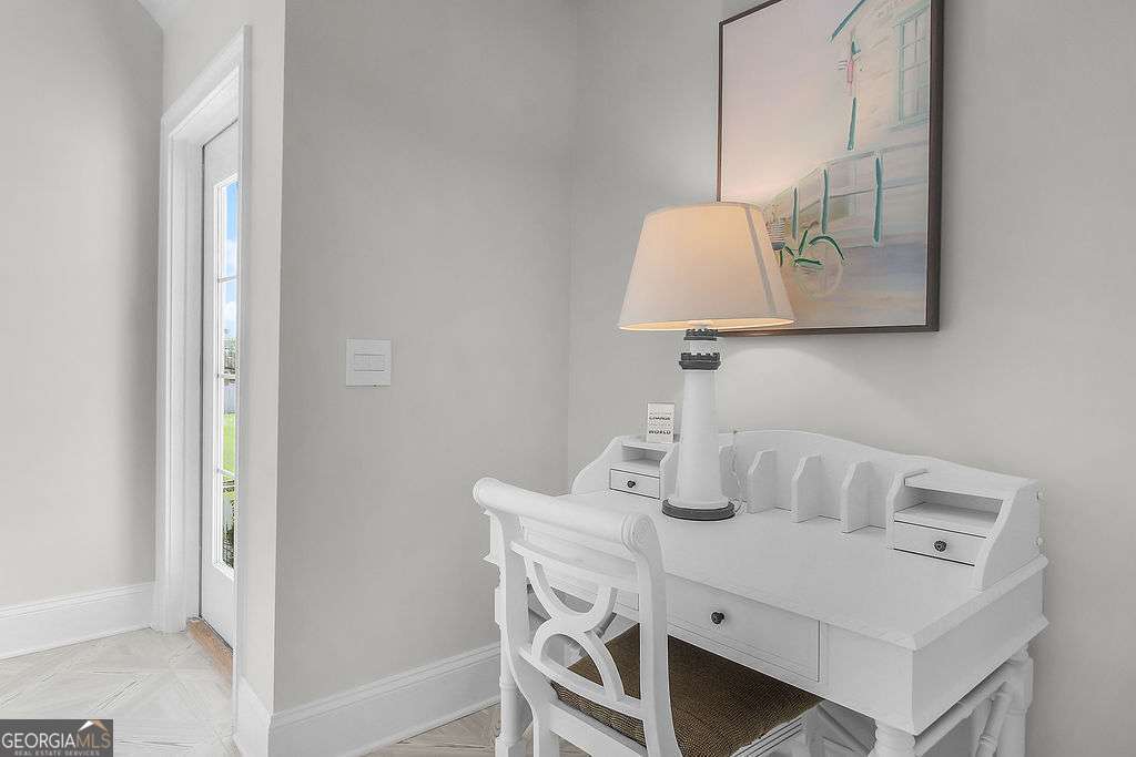 20 Taylor Street Tybee Island, GA 31328 - Photo 63 of 85 a room with a table and a lamp