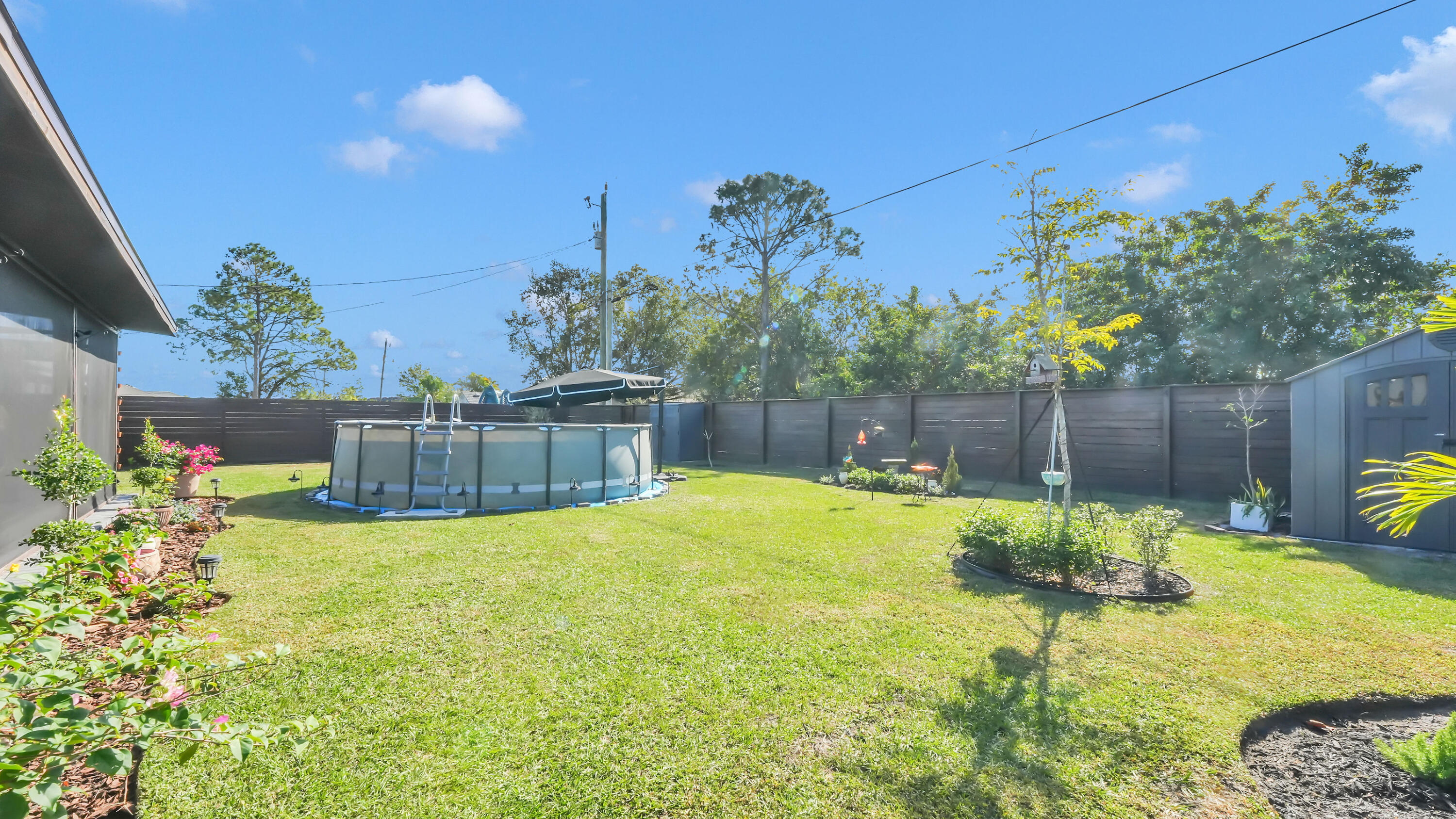 1382 Southwest Becker Road Port St. Lucie, FL 34953 - Photo 5 of 55 large backyard