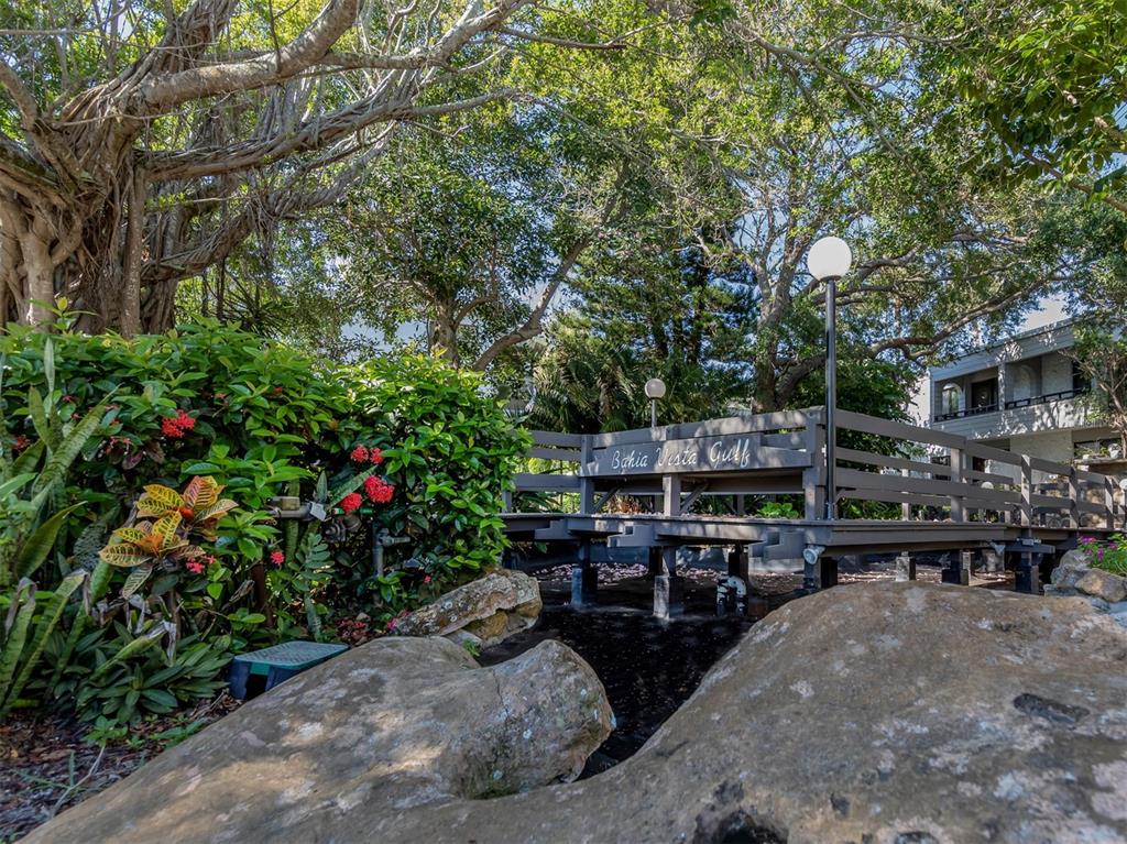 1555 Tarpon Center Drive, Unit 140 Venice, FL 34285 - Photo 44 of 60 a view of a chairs and table in the backyard