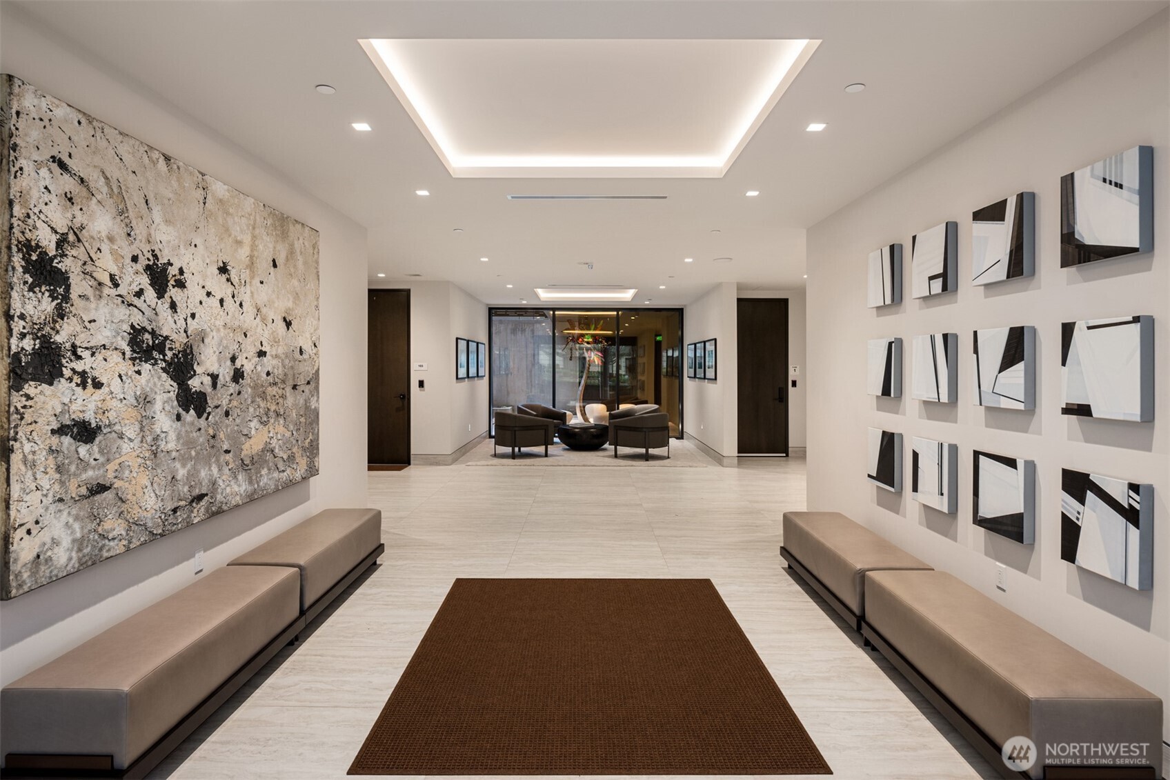 8 100th Avenue Northeast, Unit 201 Bellevue, WA 98004 - Photo 3 of 35 a living room with furniture and a rug