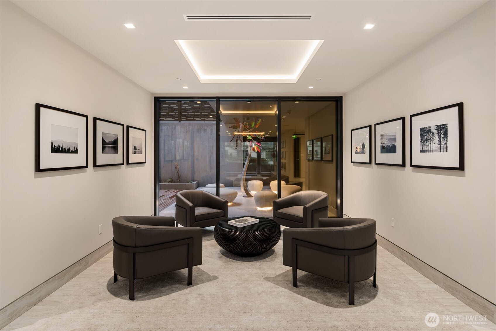 8 100th Avenue Northeast, Unit 201 Bellevue, WA 98004 - Photo 4 of 35 a living room with furniture