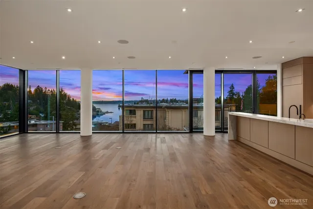 a view of a kitchen with lots of counter top space