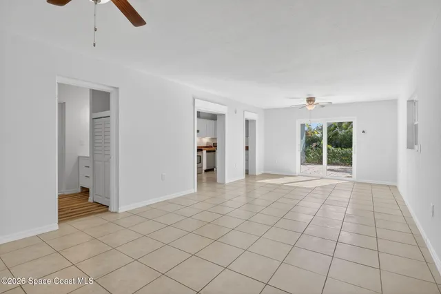 an empty room with windows