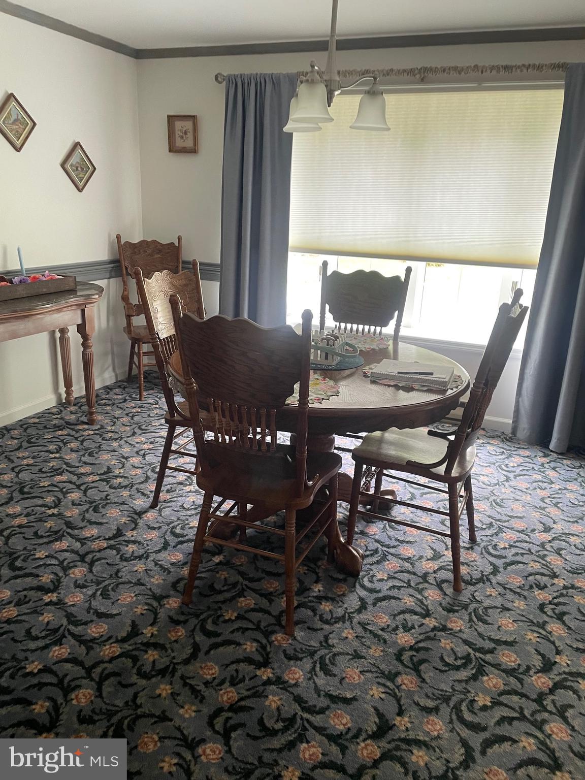 4285 Glory Road Bealeton, VA 22712 - Photo 18 of 76 a view of a dining room with furniture and wooden floor