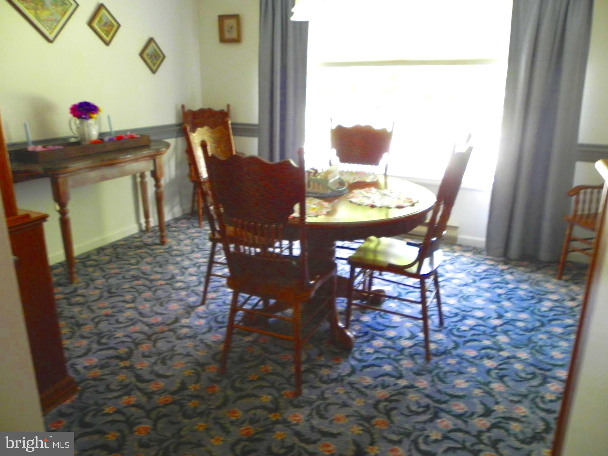 4285 Glory Road Bealeton, VA 22712 - Photo 20 of 76 a view of a dining room with furniture and a window
