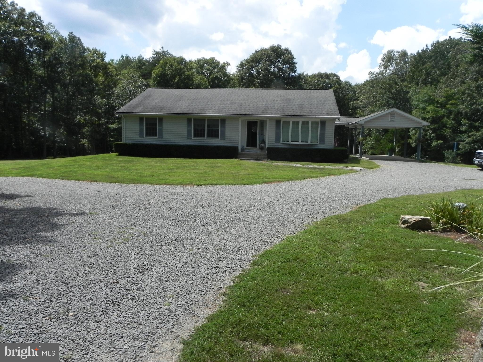 4285 Glory Road Bealeton, VA 22712 - Photo 2 of 76 a front view of house with yard and green space