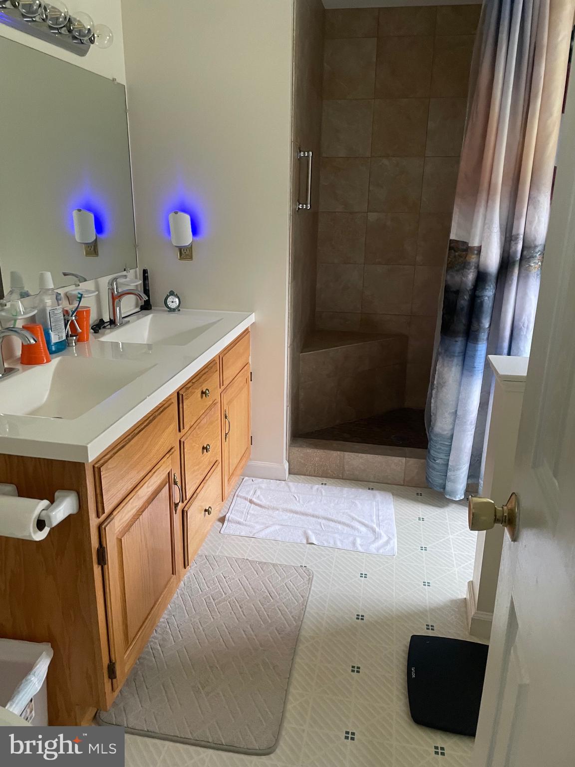 4285 Glory Road Bealeton, VA 22712 - Photo 33 of 76 a bathroom with a sink and a mirror