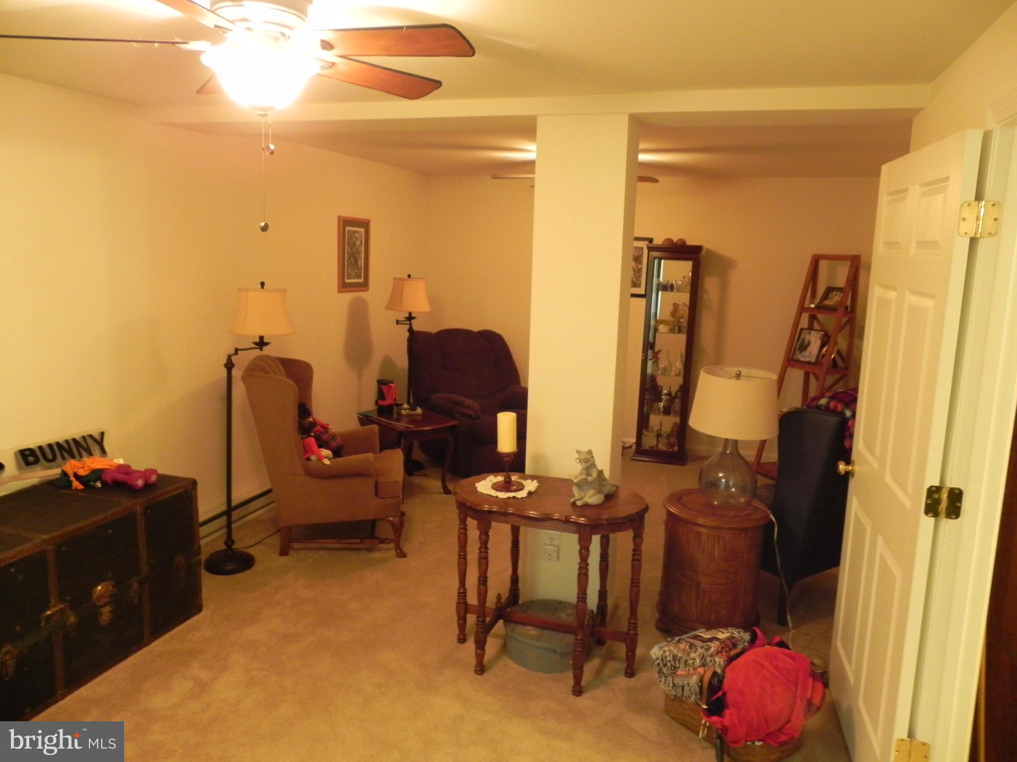 4285 Glory Road Bealeton, VA 22712 - Photo 41 of 76 a view of walk in closet with clothes and shoes