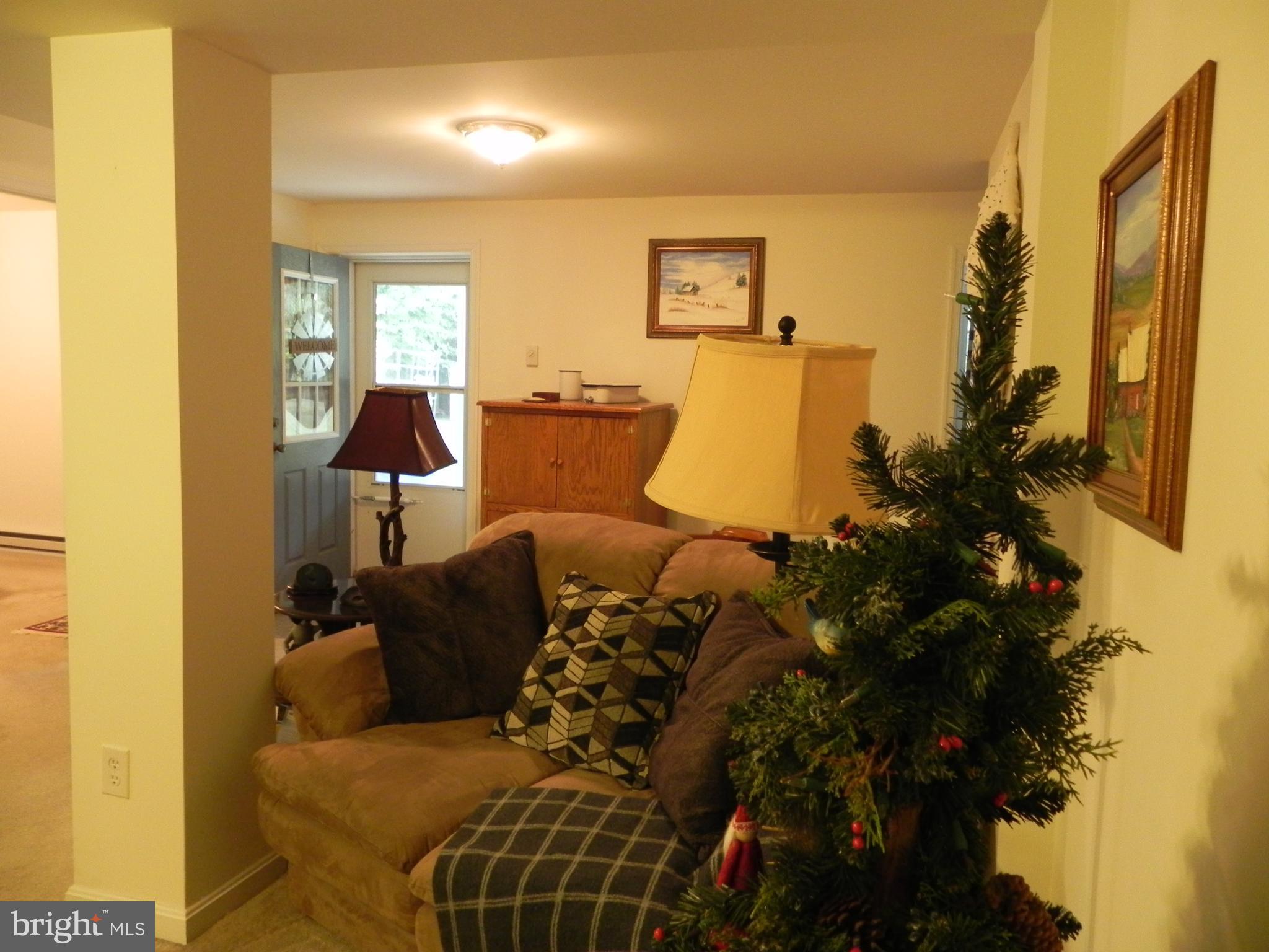 4285 Glory Road Bealeton, VA 22712 - Photo 47 of 76 a living room with furniture and a window