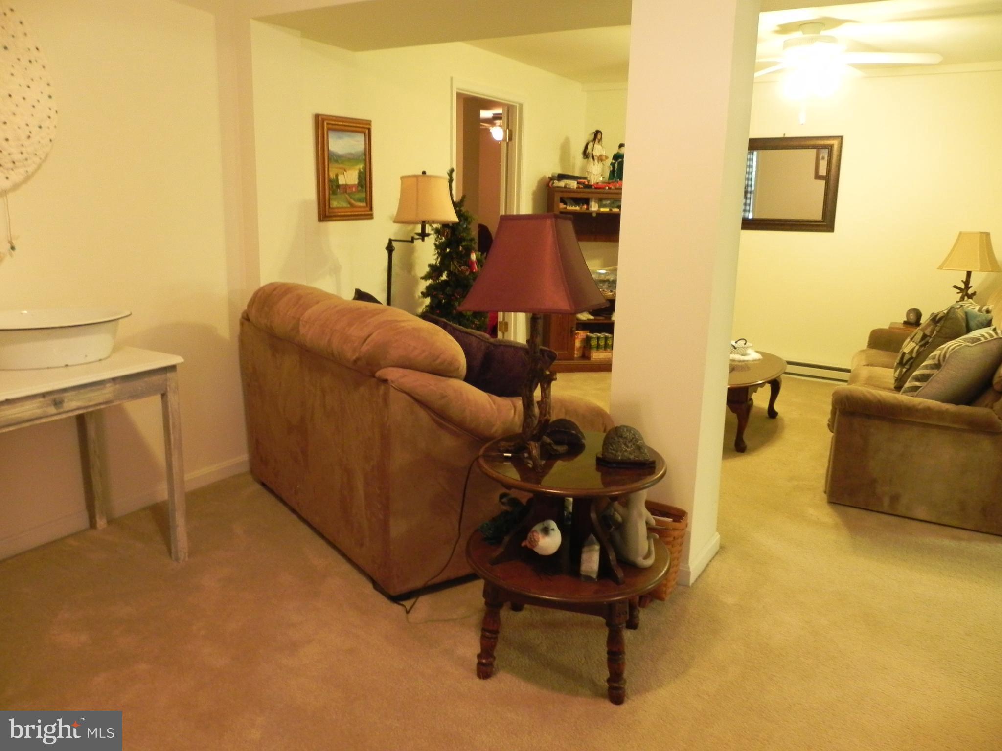 4285 Glory Road Bealeton, VA 22712 - Photo 49 of 76 a living room with furniture and a couch