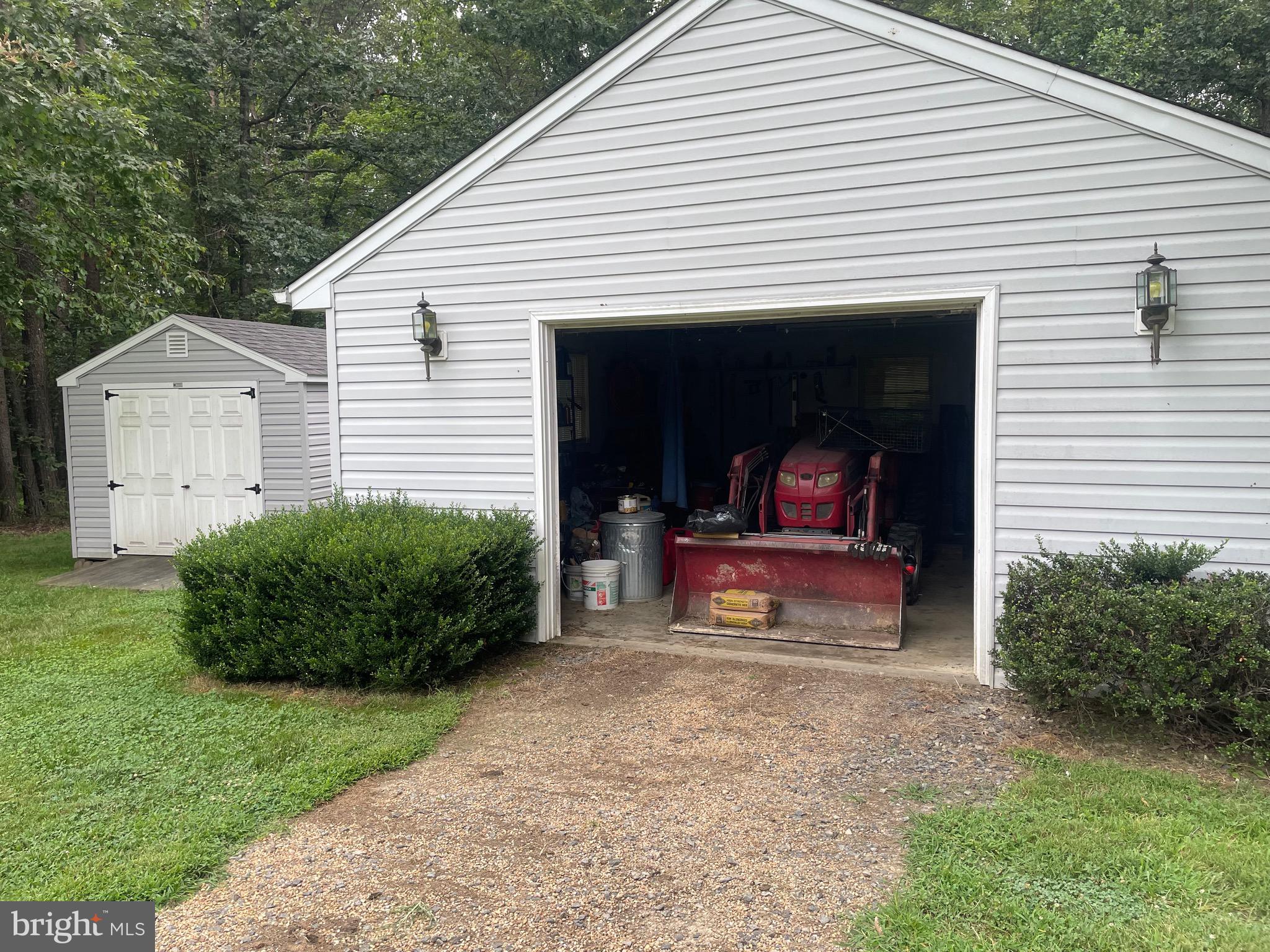4285 Glory Road Bealeton, VA 22712 - Photo 61 of 76 a view of a house with a yard and plants