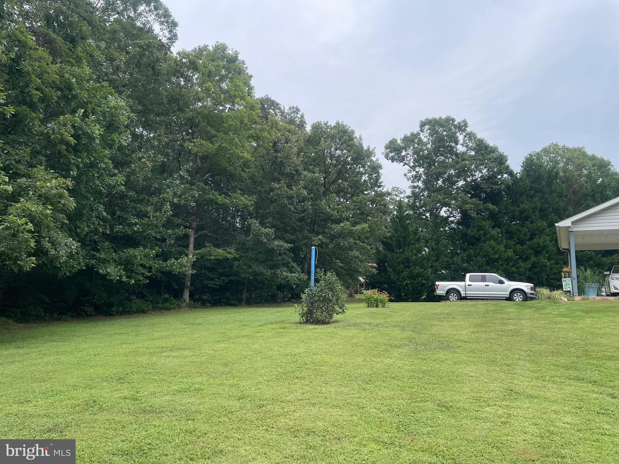 4285 Glory Road Bealeton, VA 22712 - Photo 9 of 76 a backyard of a house with trampoline