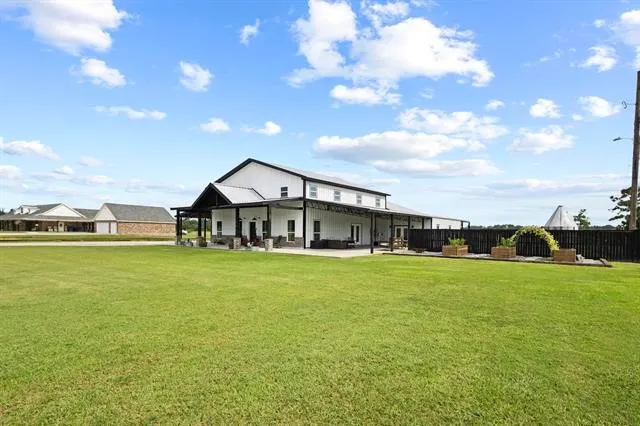 a house view with a garden space