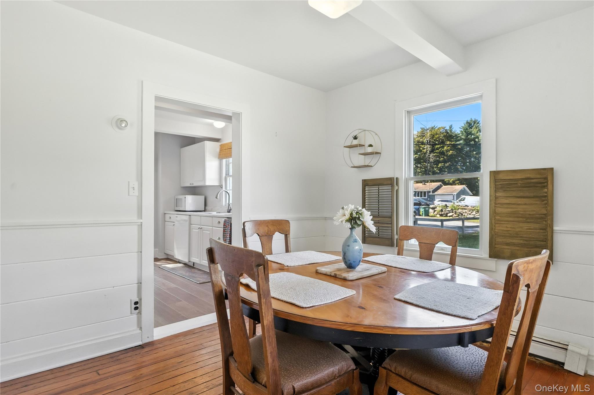 168 Gleneida Ridge Road Carmel, NY 10512 - Photo 11 of 48 a view of a dining room with furniture window and wooden floor
