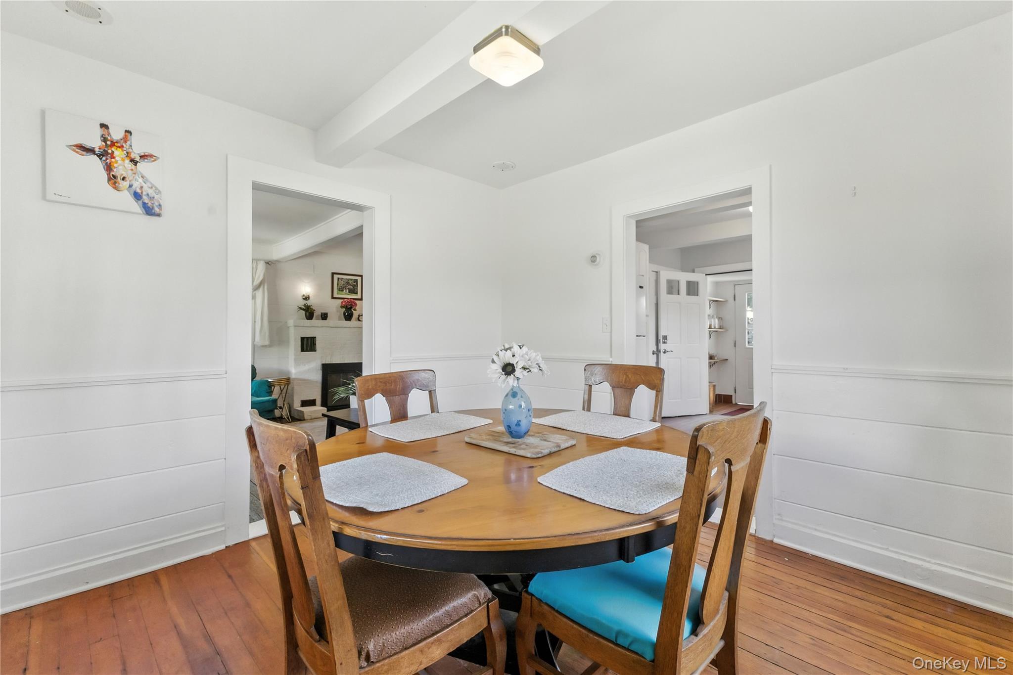168 Gleneida Ridge Road Carmel, NY 10512 - Photo 13 of 48 a view of a dining room with furniture and wooden floor