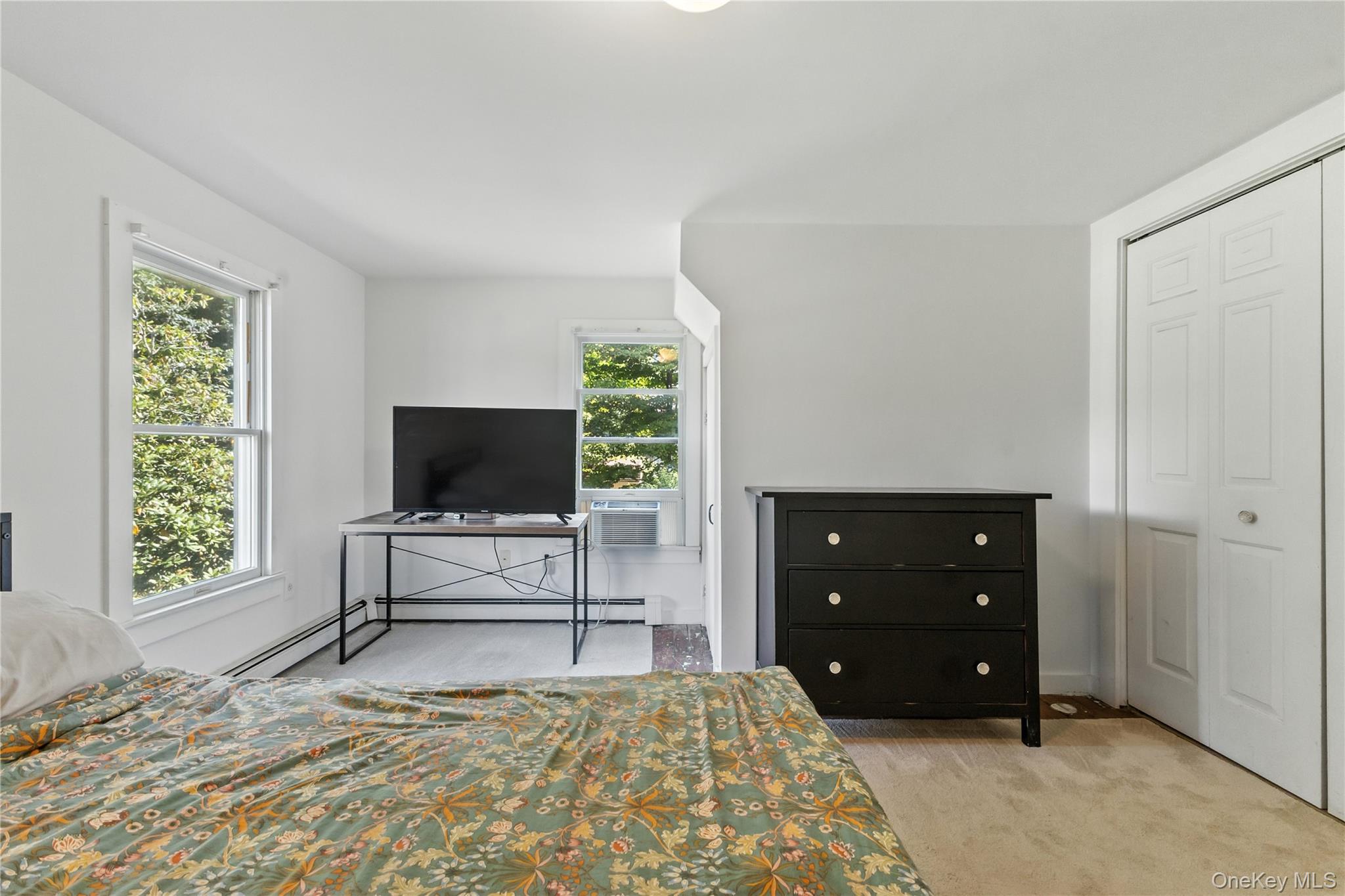 168 Gleneida Ridge Road Carmel, NY 10512 - Photo 21 of 48 a living room with furniture and a flat screen tv