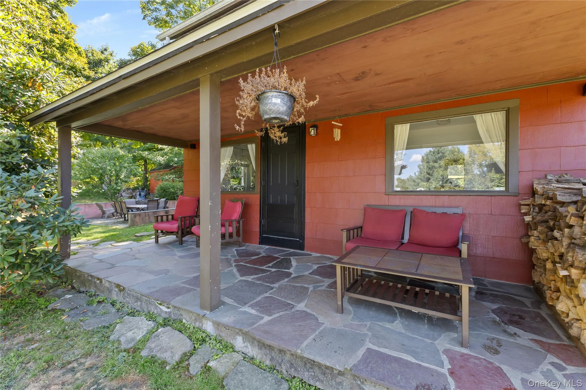 168 Gleneida Ridge Road Carmel, NY 10512 - Photo 3 of 48 a outdoor living space with furniture and a potted plant