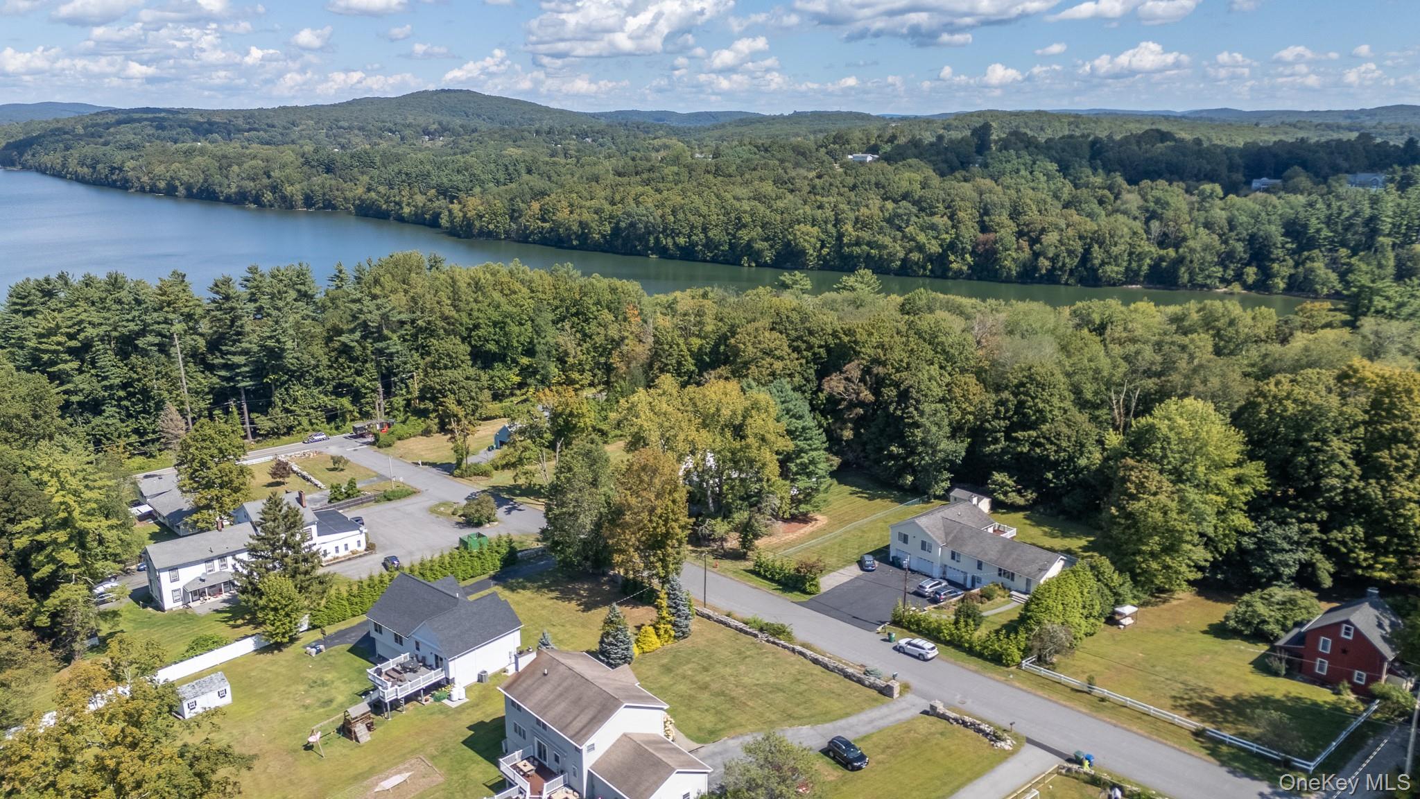 168 Gleneida Ridge Road Carmel, NY 10512 - Photo 43 of 48 an aerial view of a house with a garden and lake view