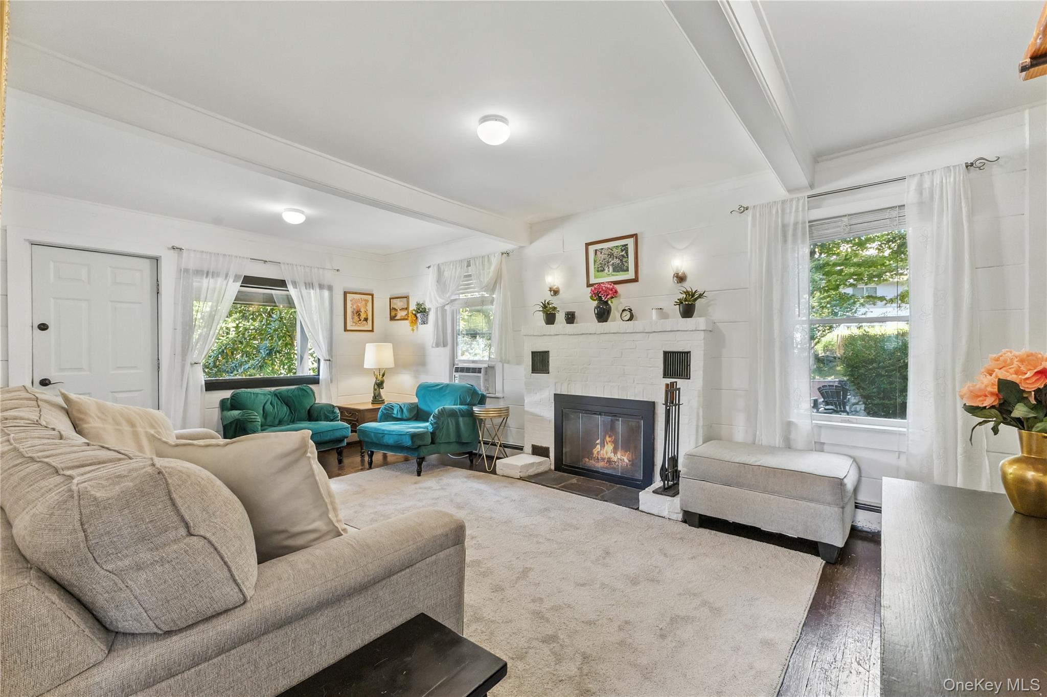 168 Gleneida Ridge Road Carmel, NY 10512 - Photo 6 of 48 a living room with furniture and a fireplace