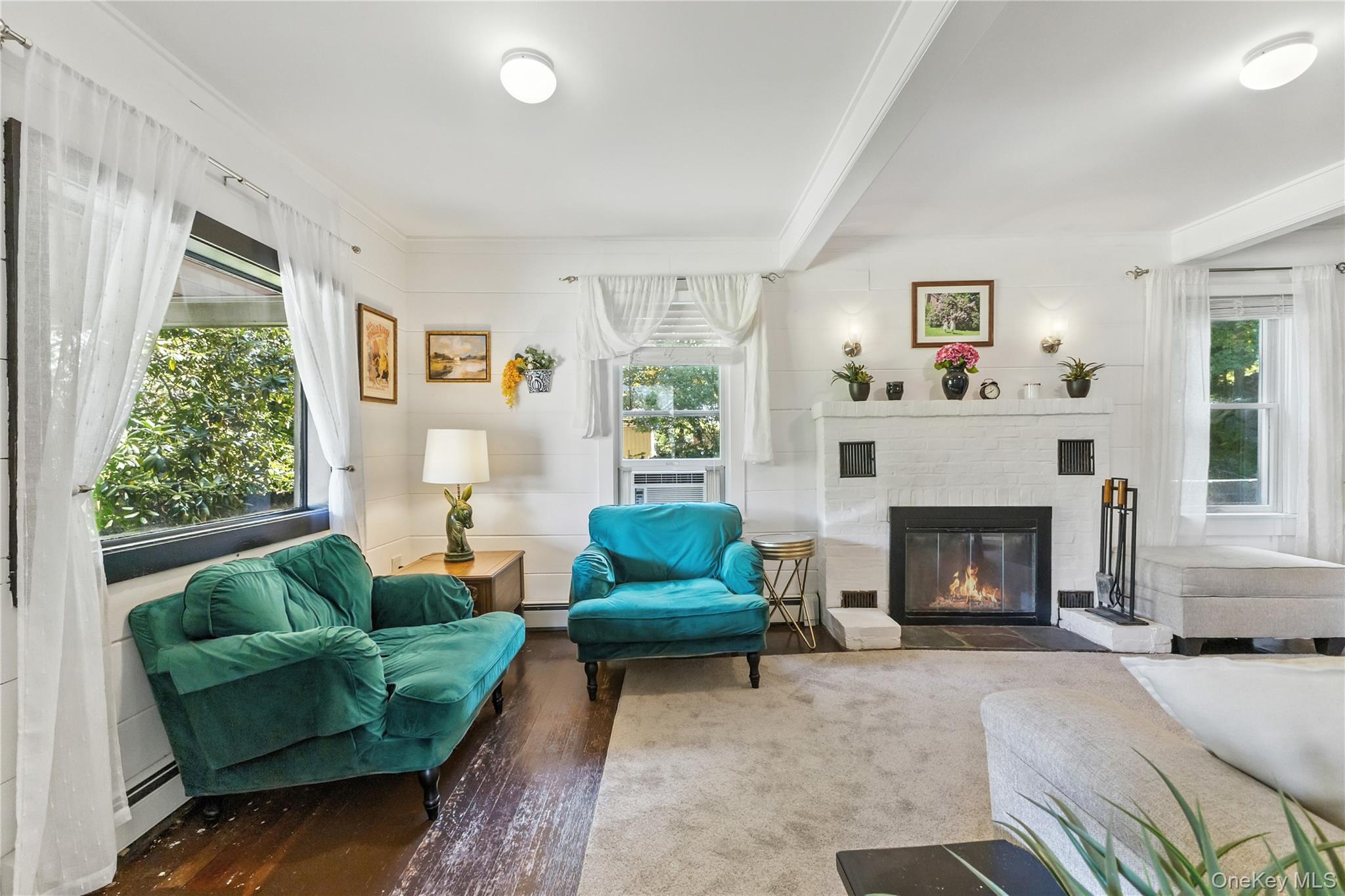 168 Gleneida Ridge Road Carmel, NY 10512 - Photo 9 of 48 a living room with furniture and a fireplace