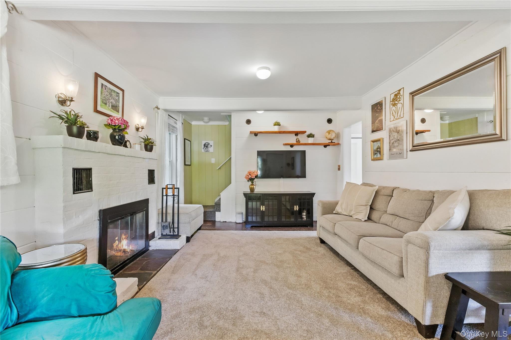 168 Gleneida Ridge Road Carmel, NY 10512 - Photo 10 of 48 a living room with furniture and a fireplace