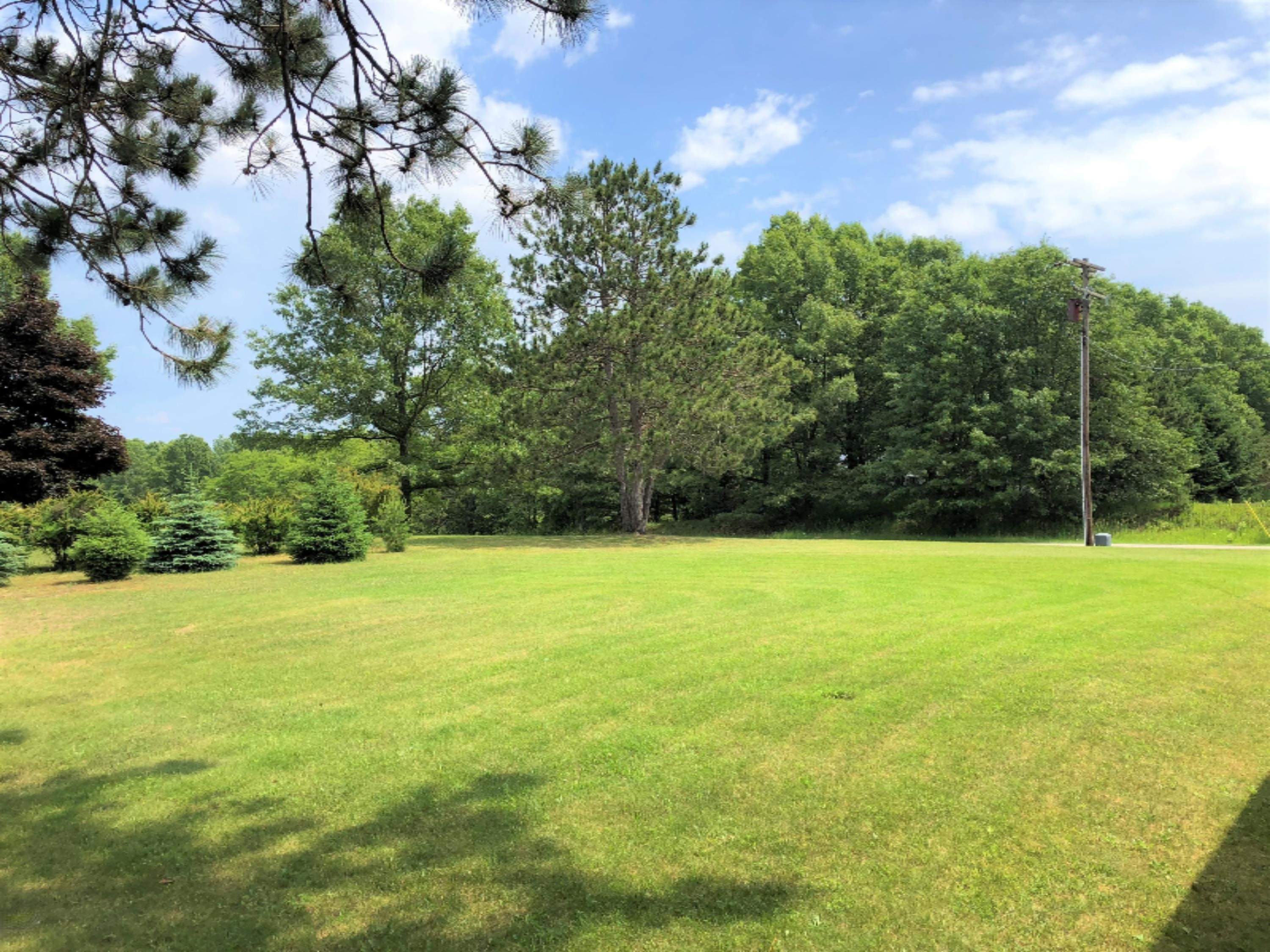 1588 Cherry Road Manistee, MI 49660 - Photo 30 of 31 Side Yard