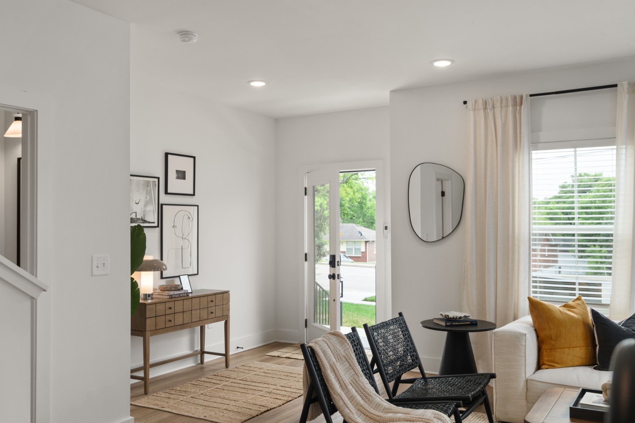 320 Mullberry Terrace, Unit A Madison, TN 37115 - Photo 2 of 26 a living room with furniture a window and a potted plant