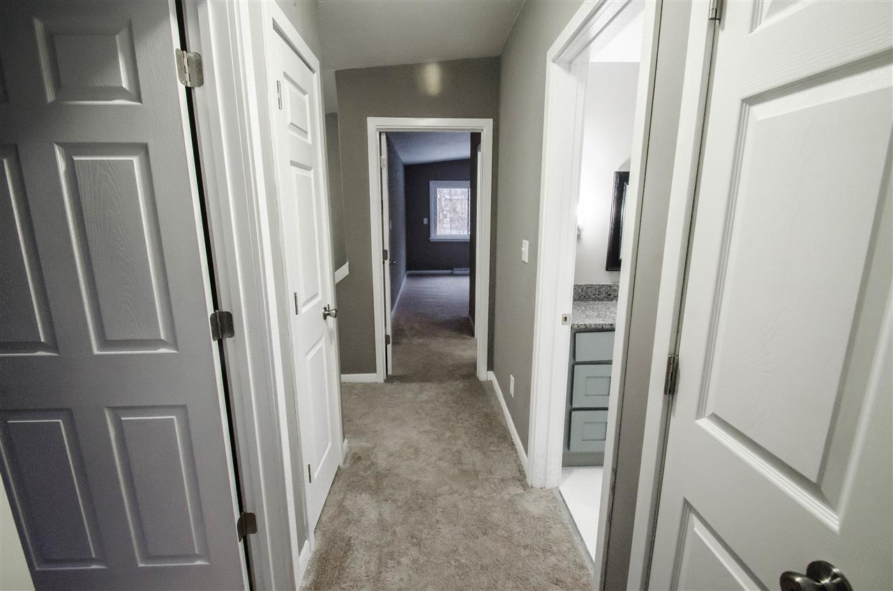 3209 North View Road Rockford, IL 61107 - Photo 17 of 25 a view of a hallway with a wooden door