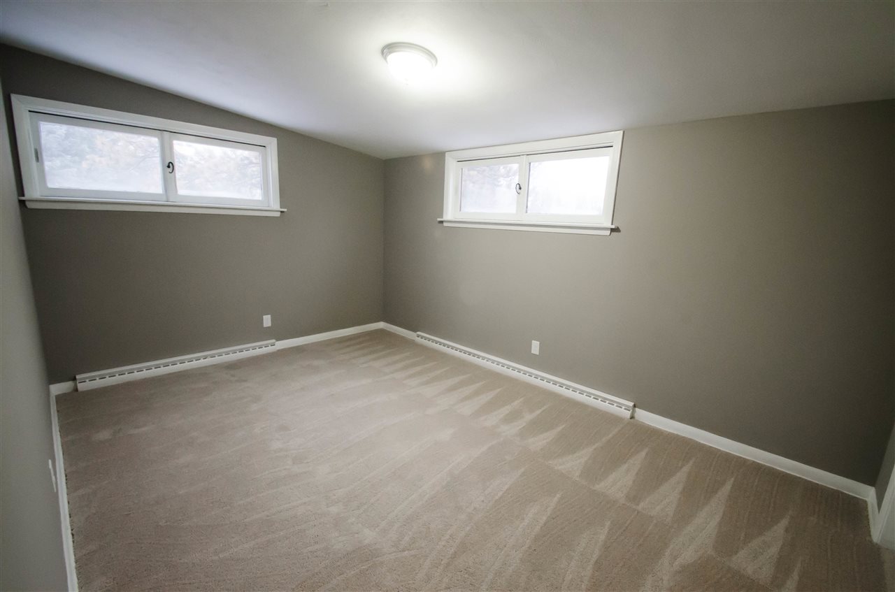 3209 North View Road Rockford, IL 61107 - Photo 21 of 25 an empty room with windows