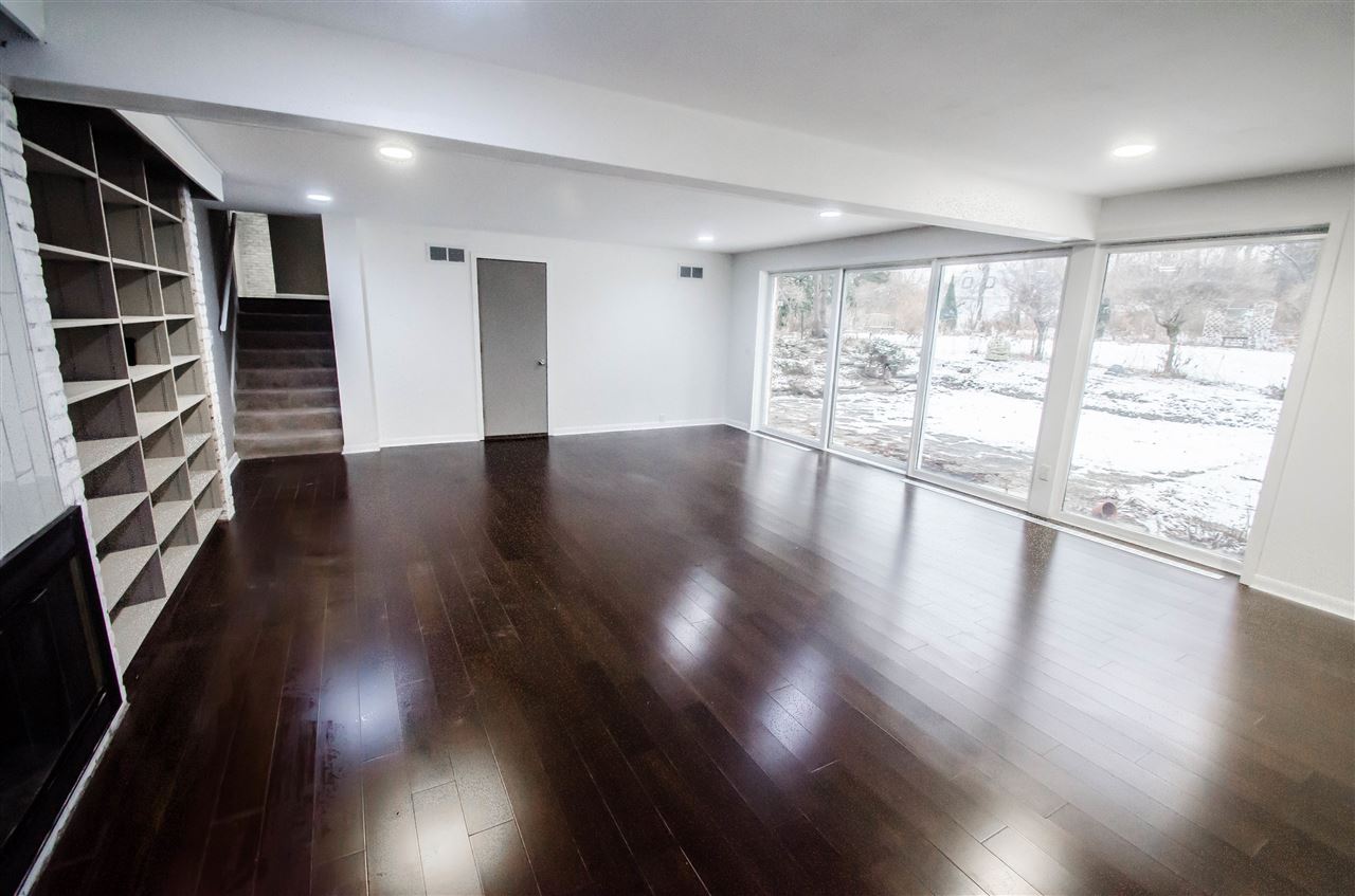 3209 North View Road Rockford, IL 61107 - Photo 23 of 25 wooden floor in an empty room with a window