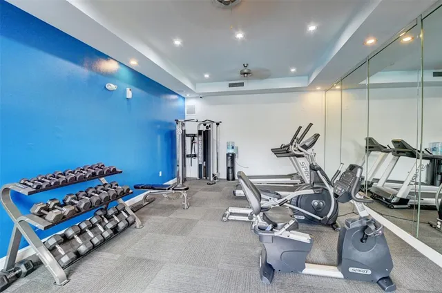 a view of a room with gym equipment