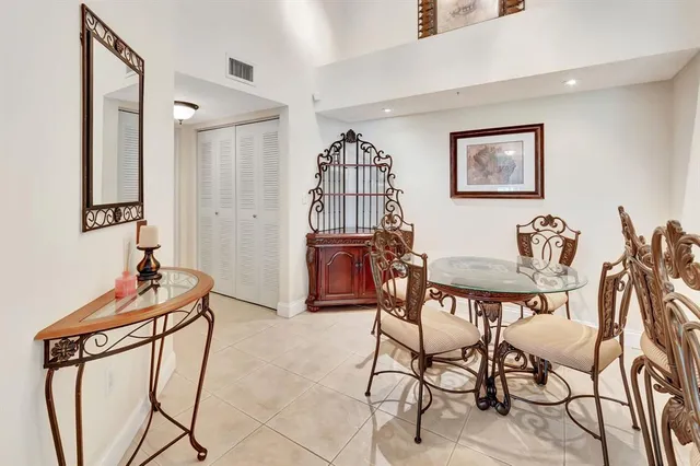 a view of a livingroom with furniture and wooden floor
