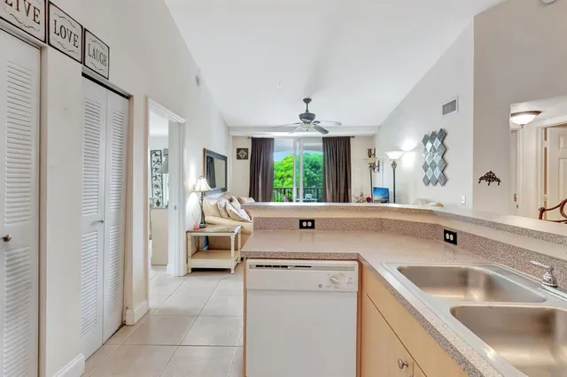 a en suite bathroom with a sink and mirror