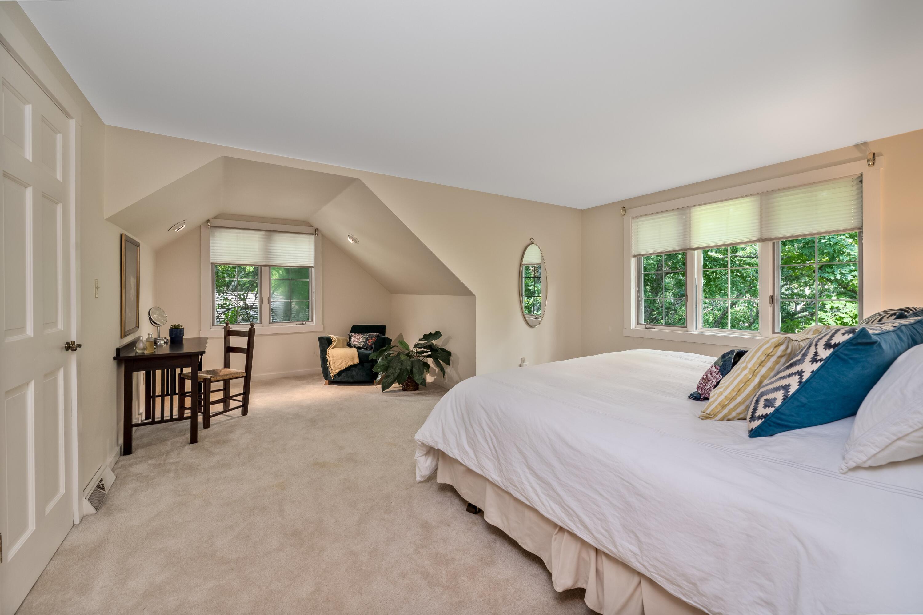W3895 Timber Lake Road Troy, WI 53120 - Photo 24 of 64 Large upper floor bedroom with sitting area and 2 large walk-in closets and views of the lake!
