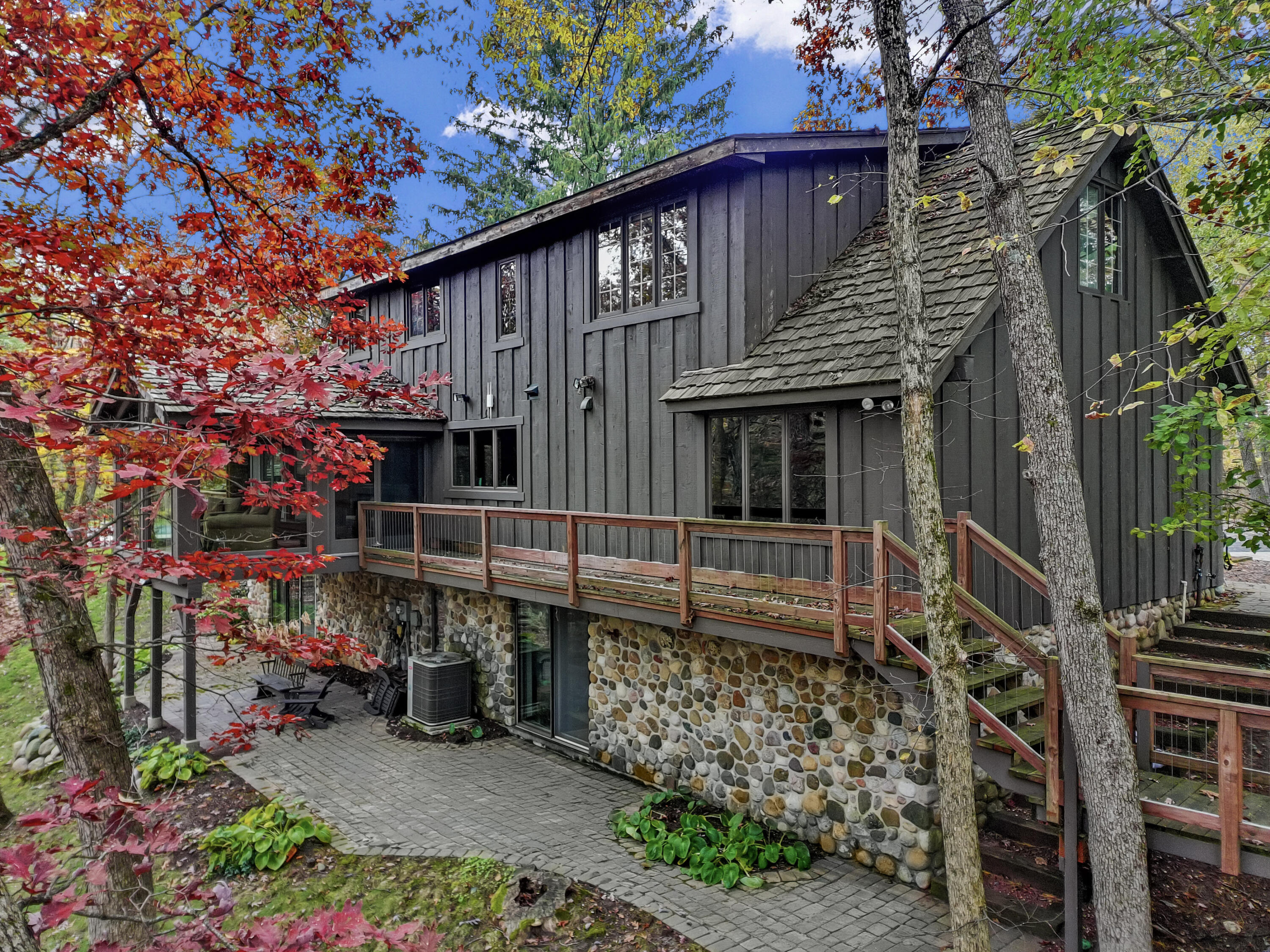 W3895 Timber Lake Road Troy, WI 53120 - Photo 33 of 64 Decks and catwalks connect the main house to cottage and pool.